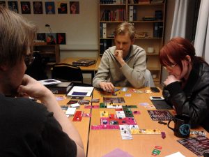 Gamers trying out Dystopolis at Goth Con 2012